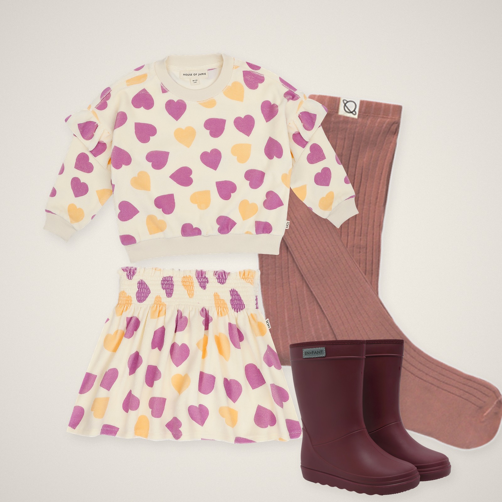 Outfit hartjes meisjes: House of Jamie sweater en rok met hartjesprint, Cozmo maillot roze en Enfant laarzen bordeaux